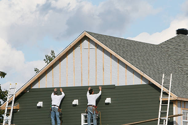 Professional Storm Damage Siding Repair technician working in Marsteller, PA